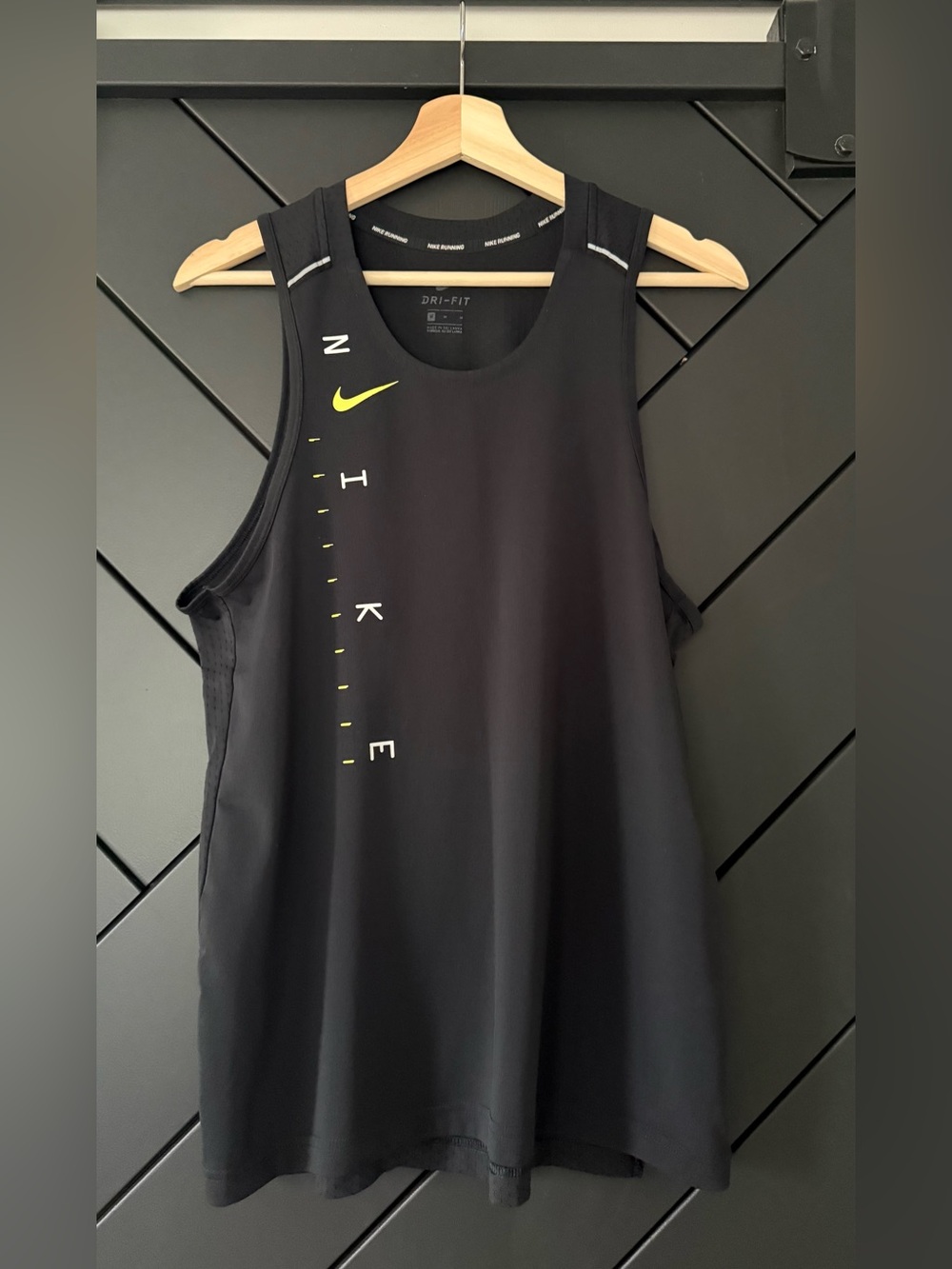 Nike Black running Tank with Yellow Swoosh and Vertical Logo